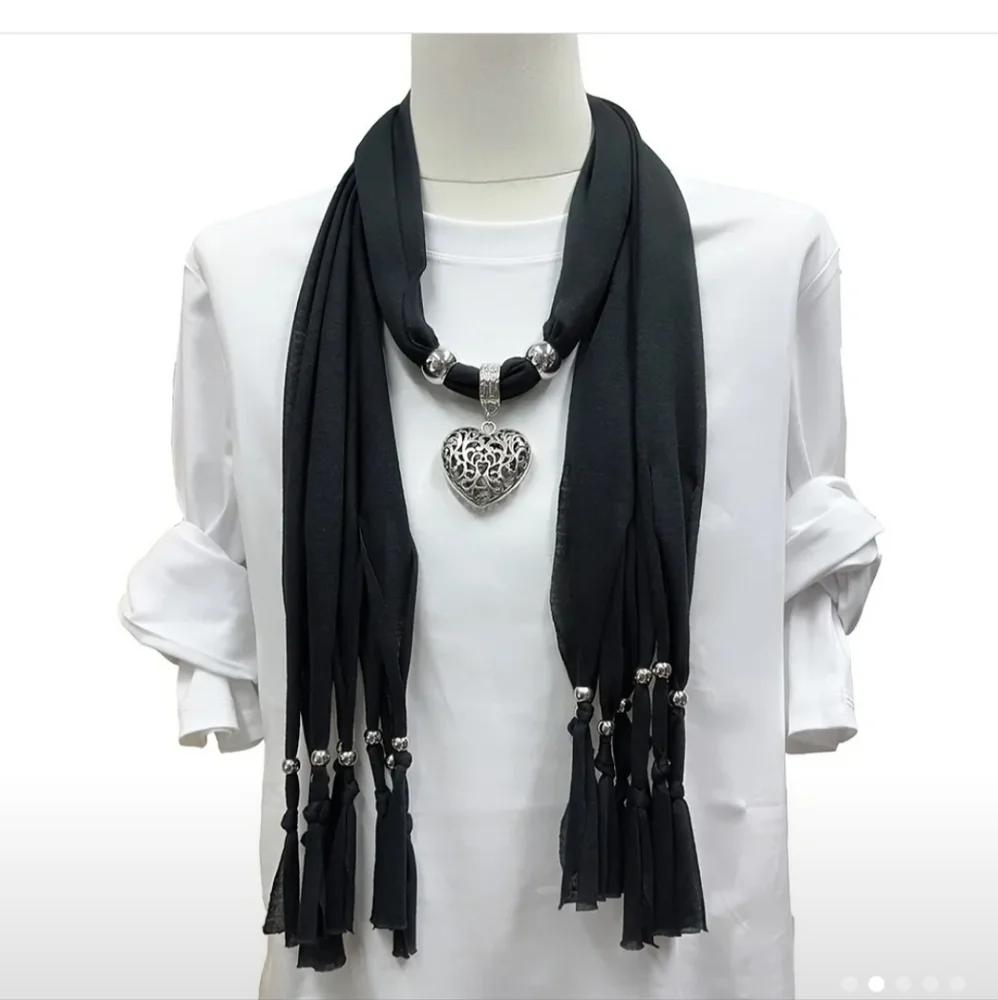 NWT Chic Black and Silver Wrap with Intricate Medallion